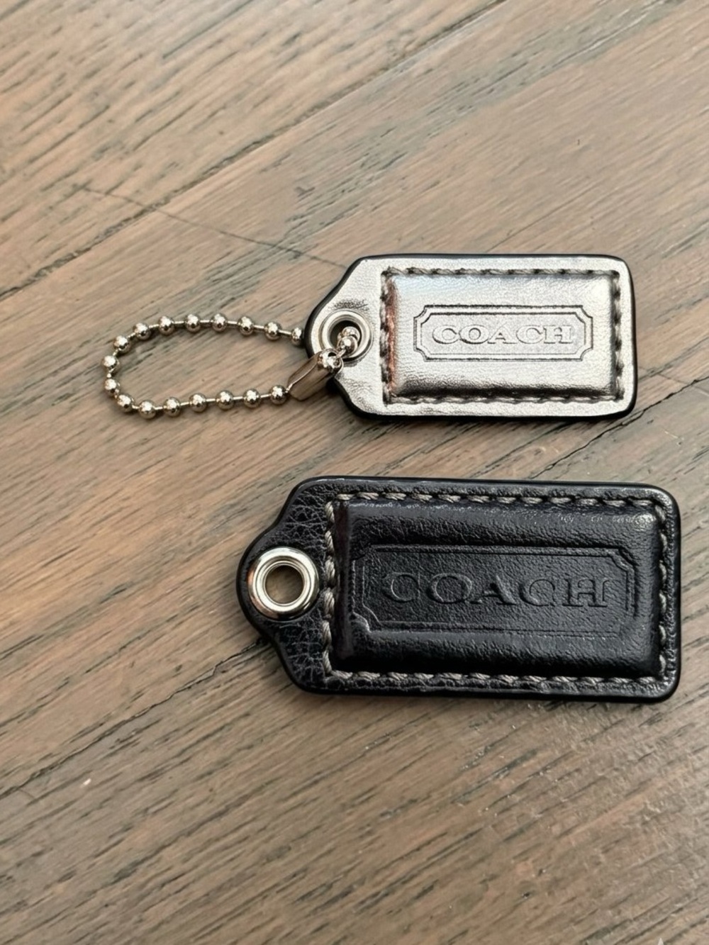 Preowned Coach Leather black and silver Hangtags